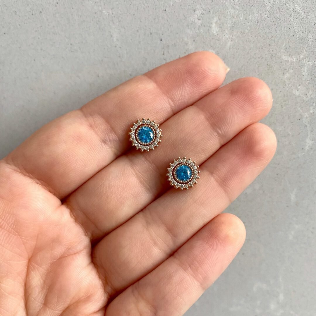 Rose gold stud earrings with topaz and cubic zirconia