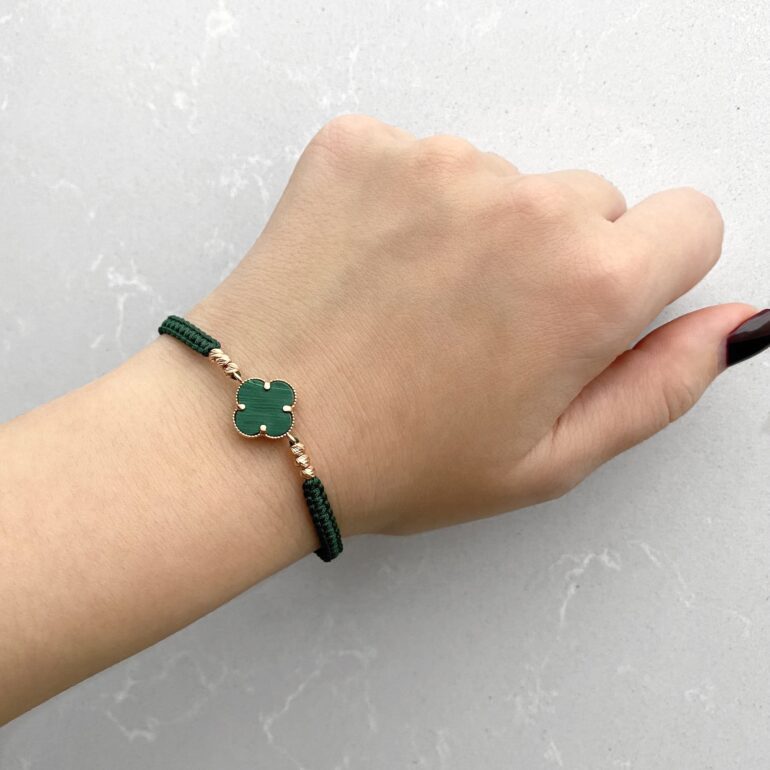 Bracelet with golden beads - four-leaf clover