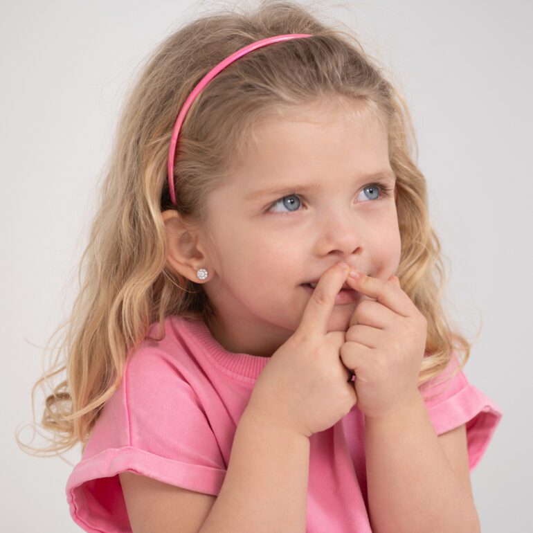 Sterling silver kids earrings with cubic zirconia.