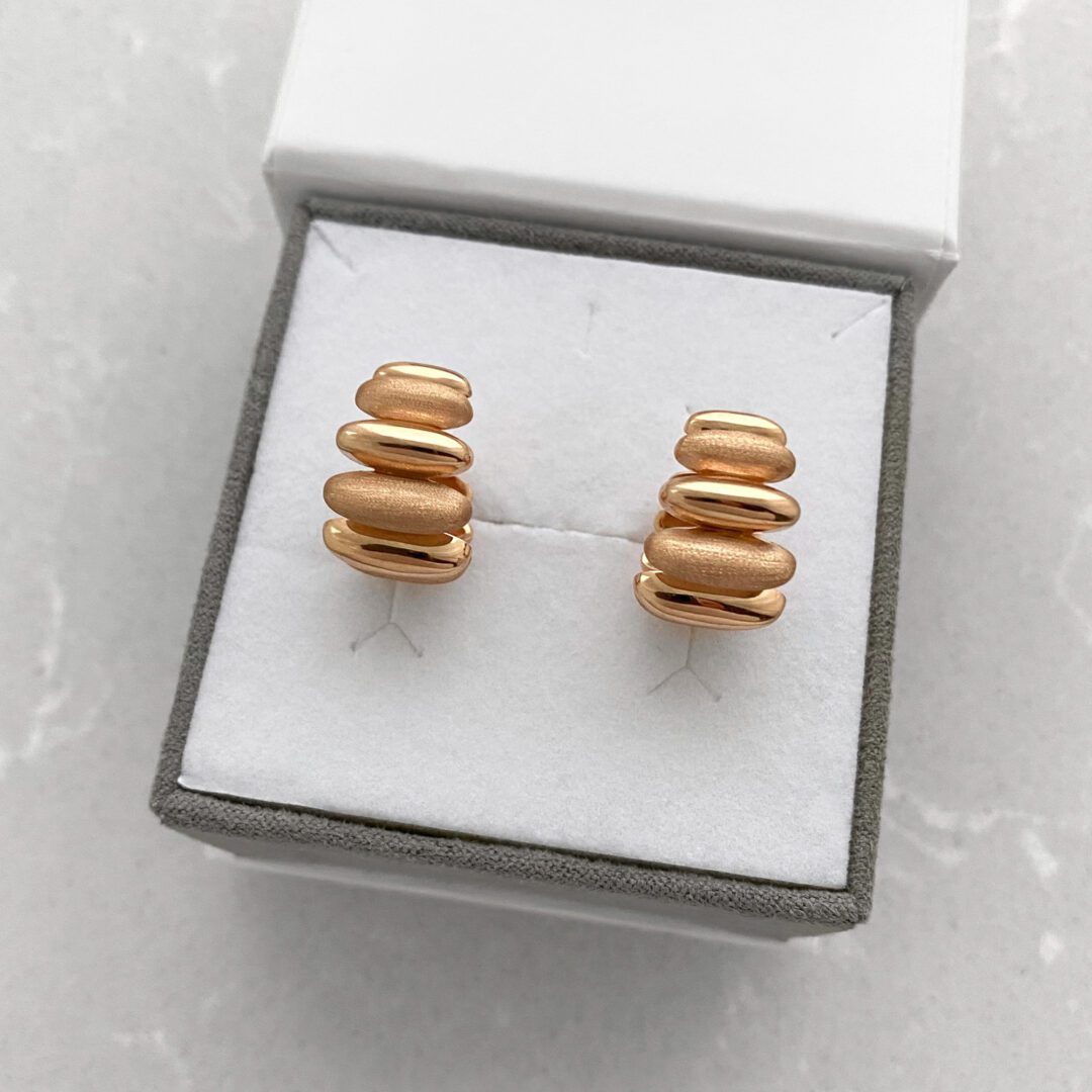 A modern rose gold hoop earrings