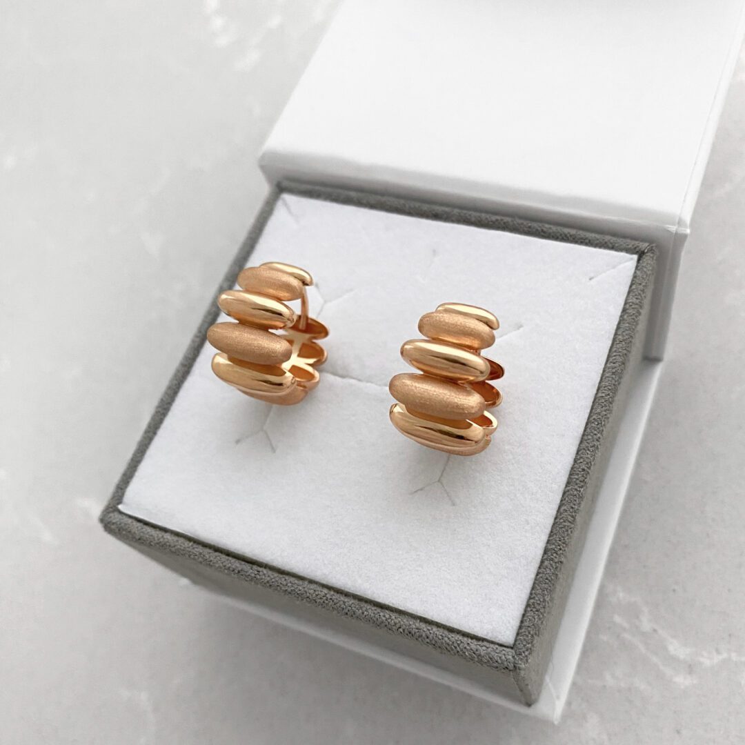 A modern rose gold hoop earrings