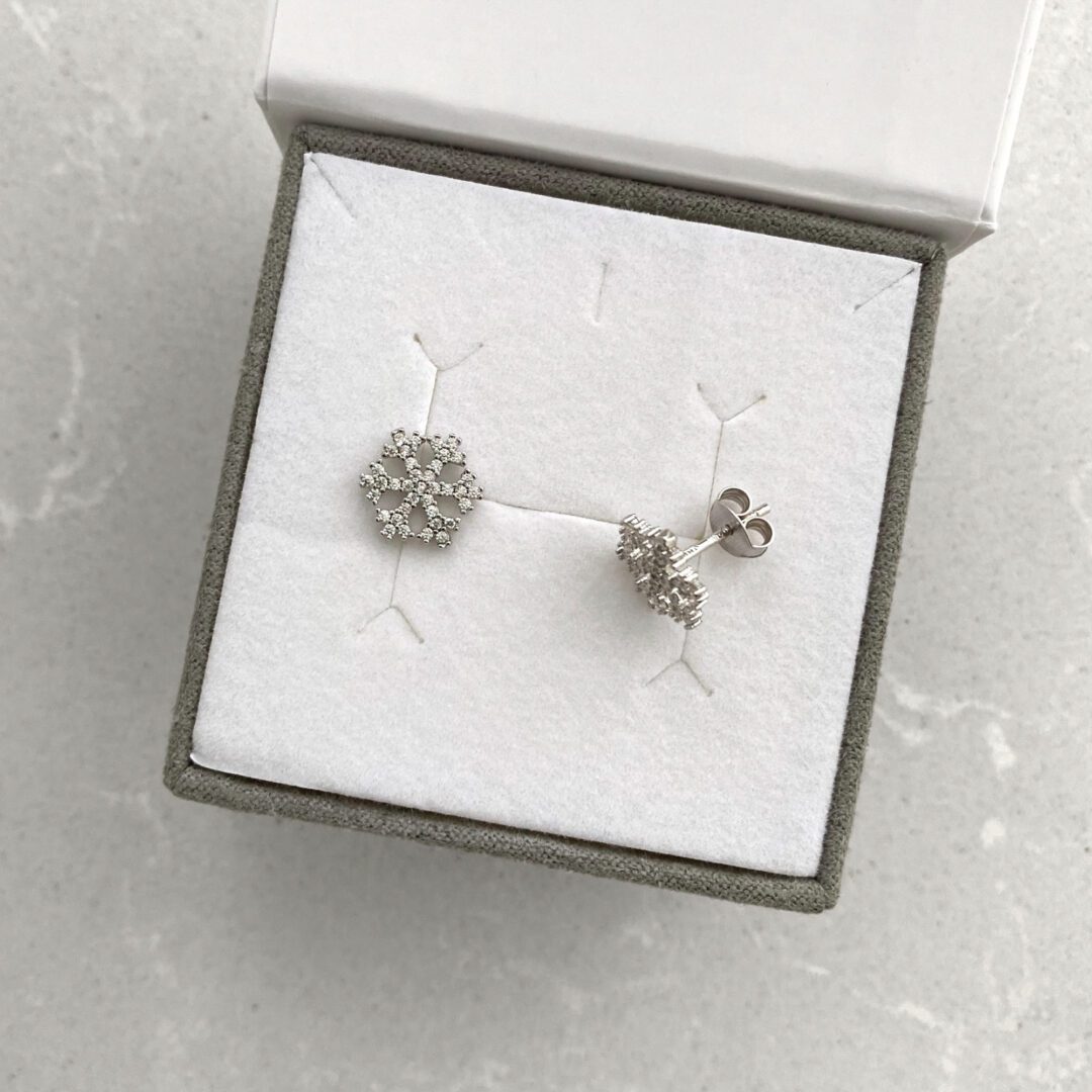 Sterling silver stud earrings with cubic zirconia - snowflakes