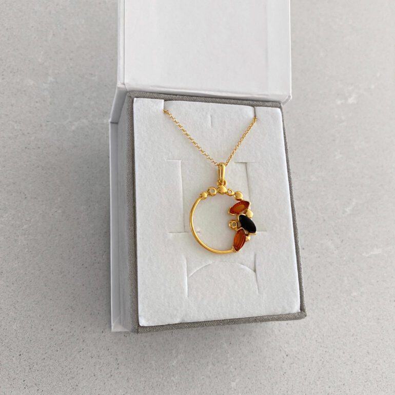 Yellow gold plated sterling silver chain with amber pendant
