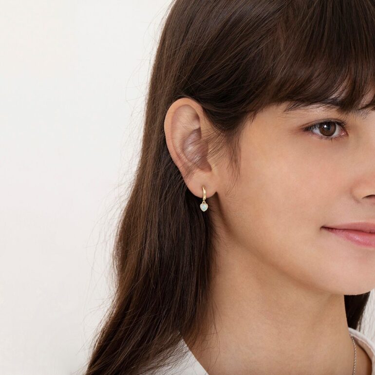 Yellow gold plated sterling silver hoop earrings with dandling opal hearts