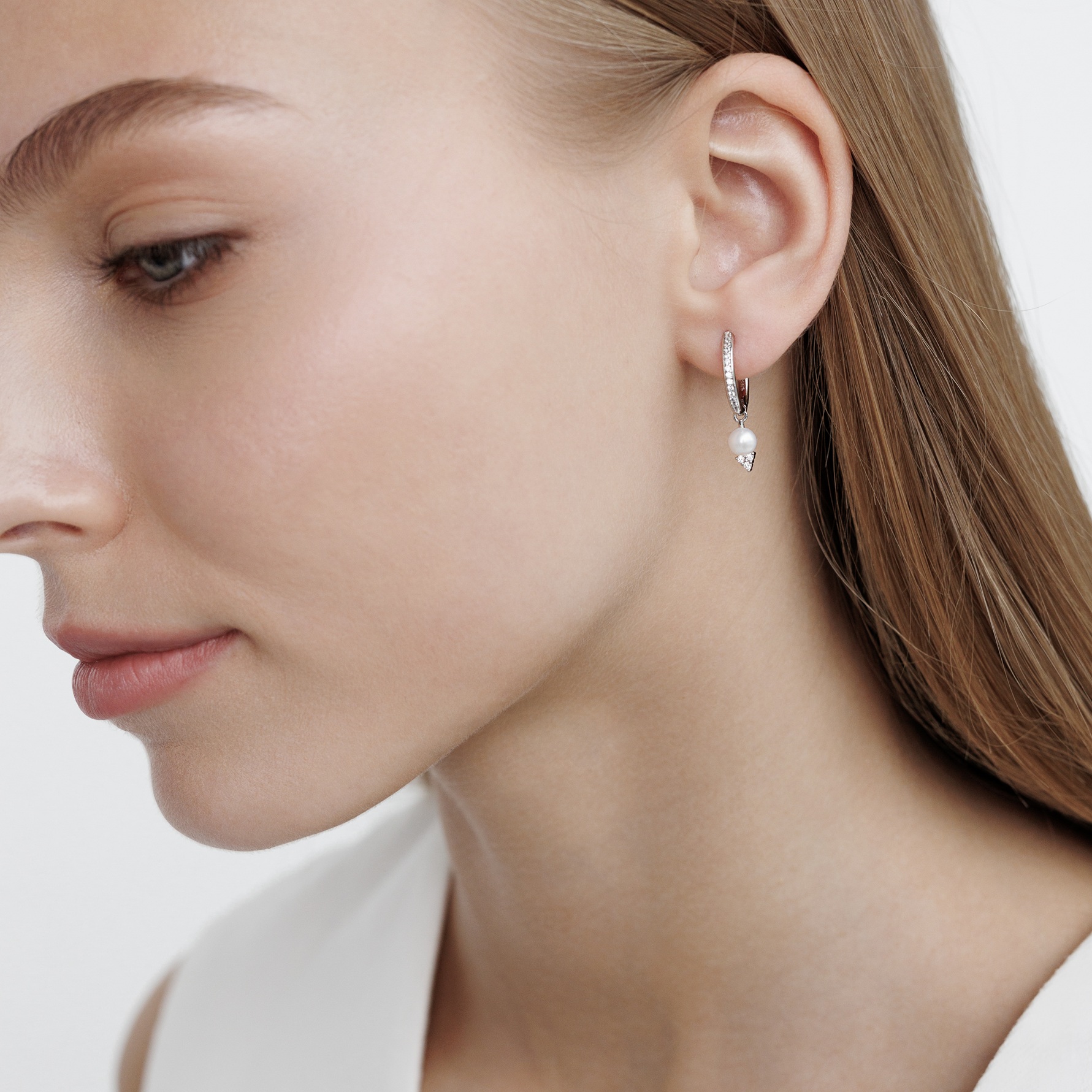 Sterling silver hoop earrings with pearls and cubic zirconia