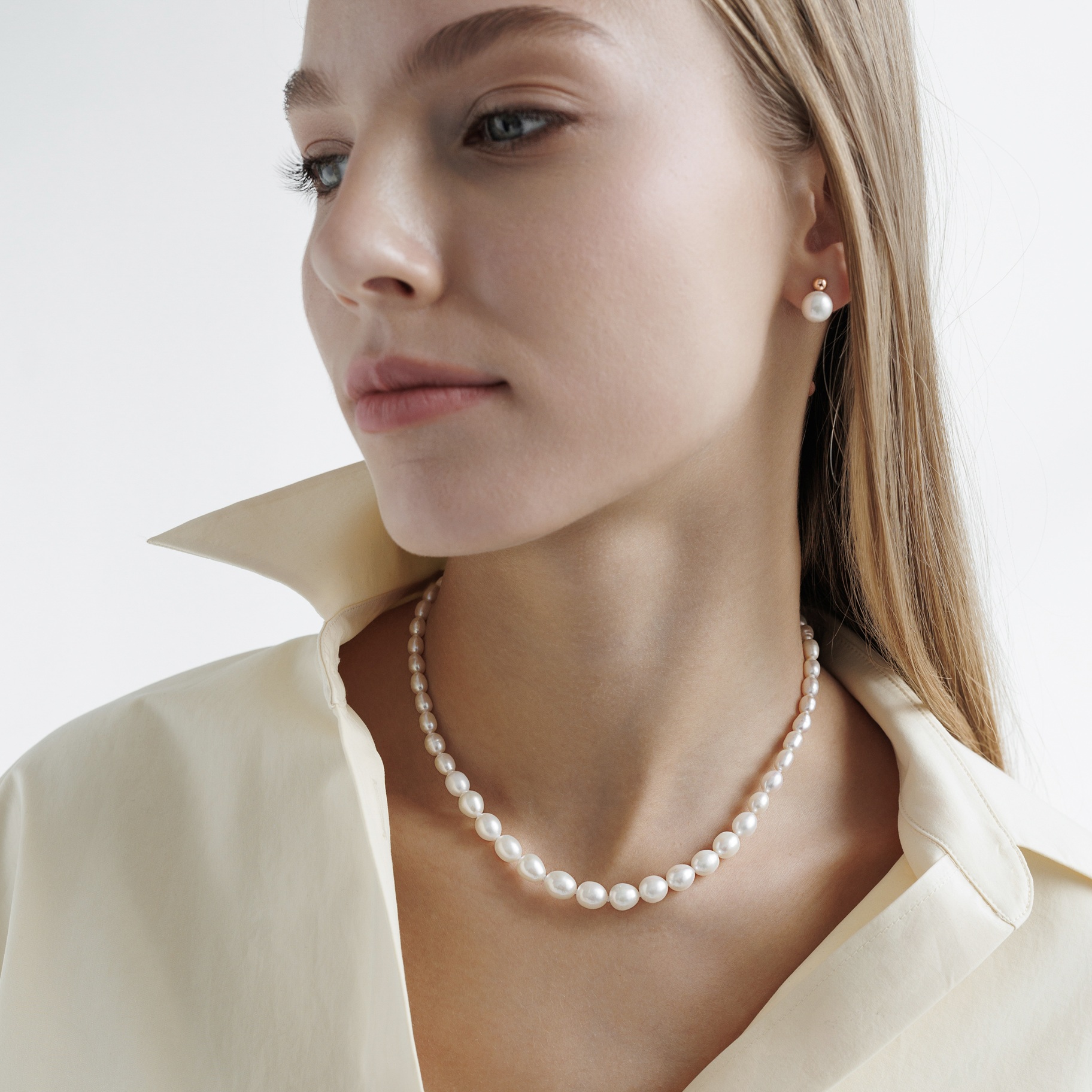 Gold plated sterling silver stud earrings with pearls