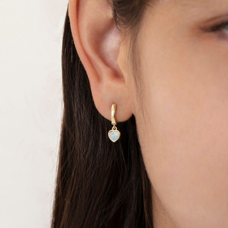 Yellow gold plated sterling silver hoop earrings with dandling opal hearts
