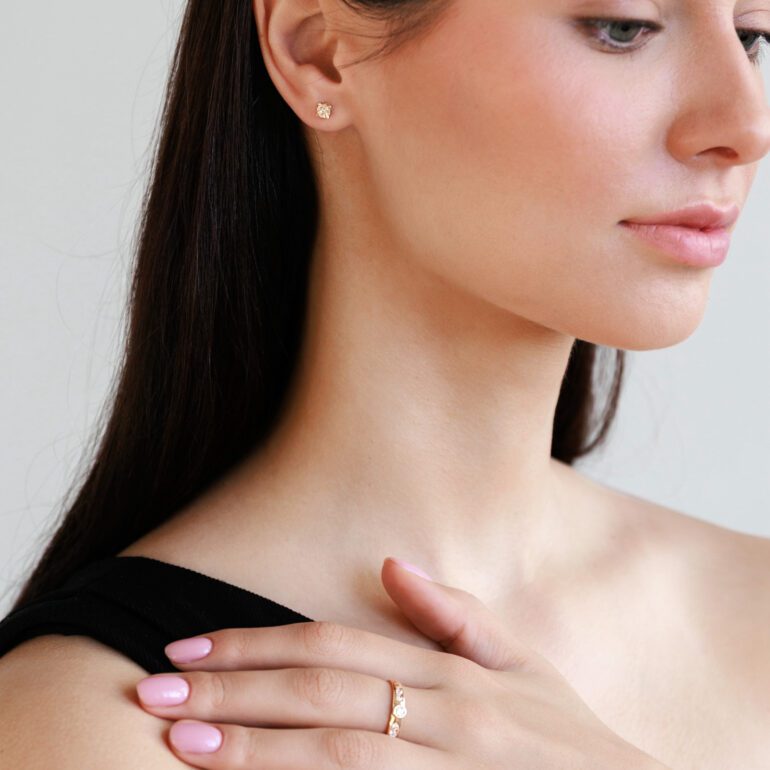 Rose gold engraved stud earrings with cubic zirconia