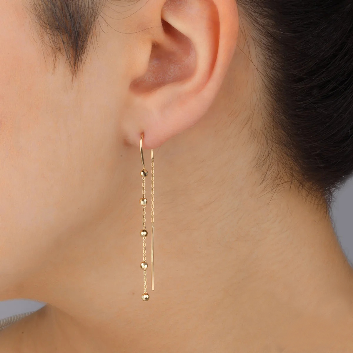 Geltono aukso auskarai grandinėlė su graviruotais aukso karoliukais