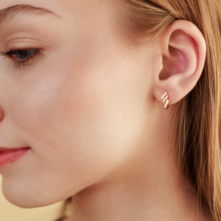 Yellow gold hoop earrings with cubic zirconia