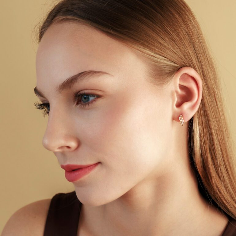 Yellow gold hoop earrings with cubic zirconia