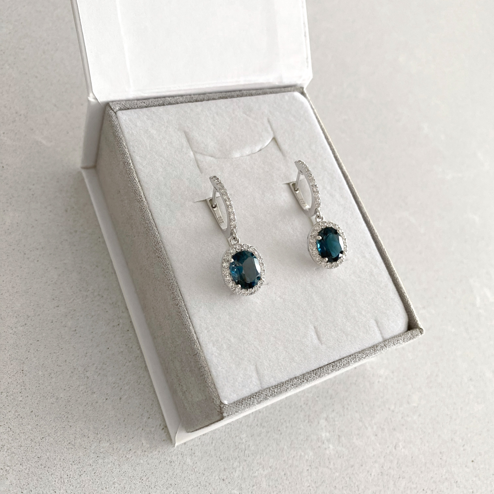 Sterling silver earrings with London blue topaz and cubic zirconia