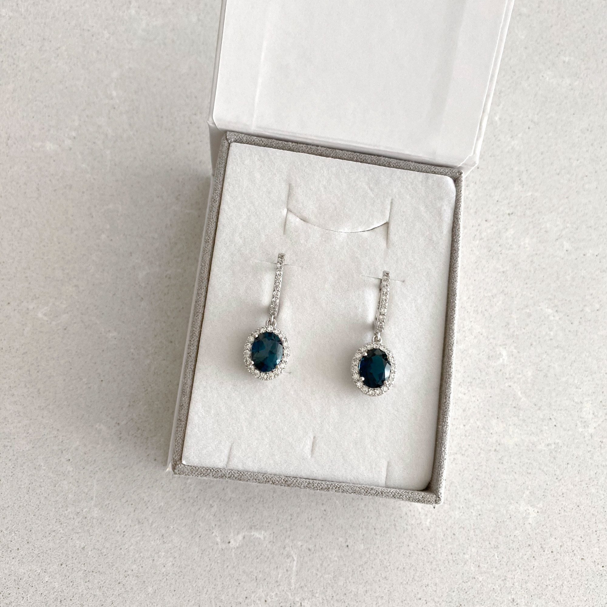 Sterling silver earrings with London blue topaz and cubic zirconia