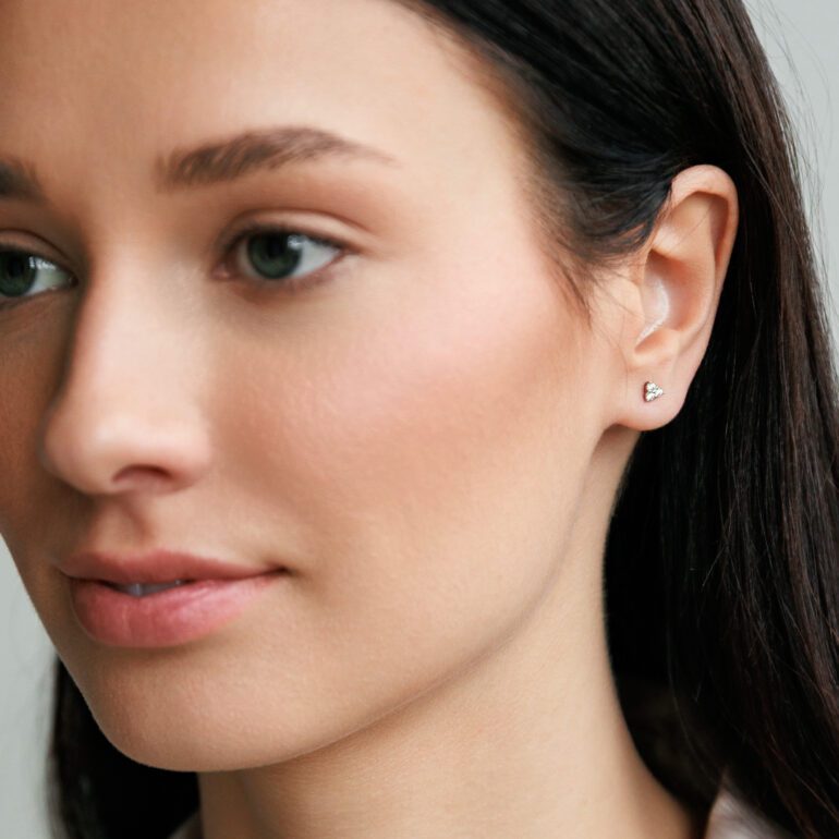 A minimalist sterling silver stud earrings with cubic zirconia
