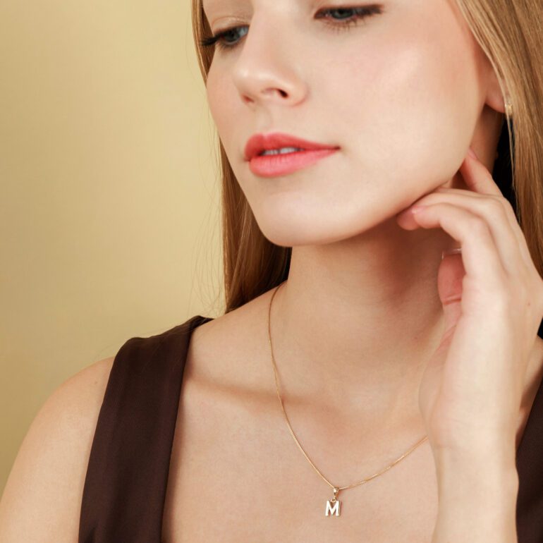 Yellow gold pendant - initial (letter) M