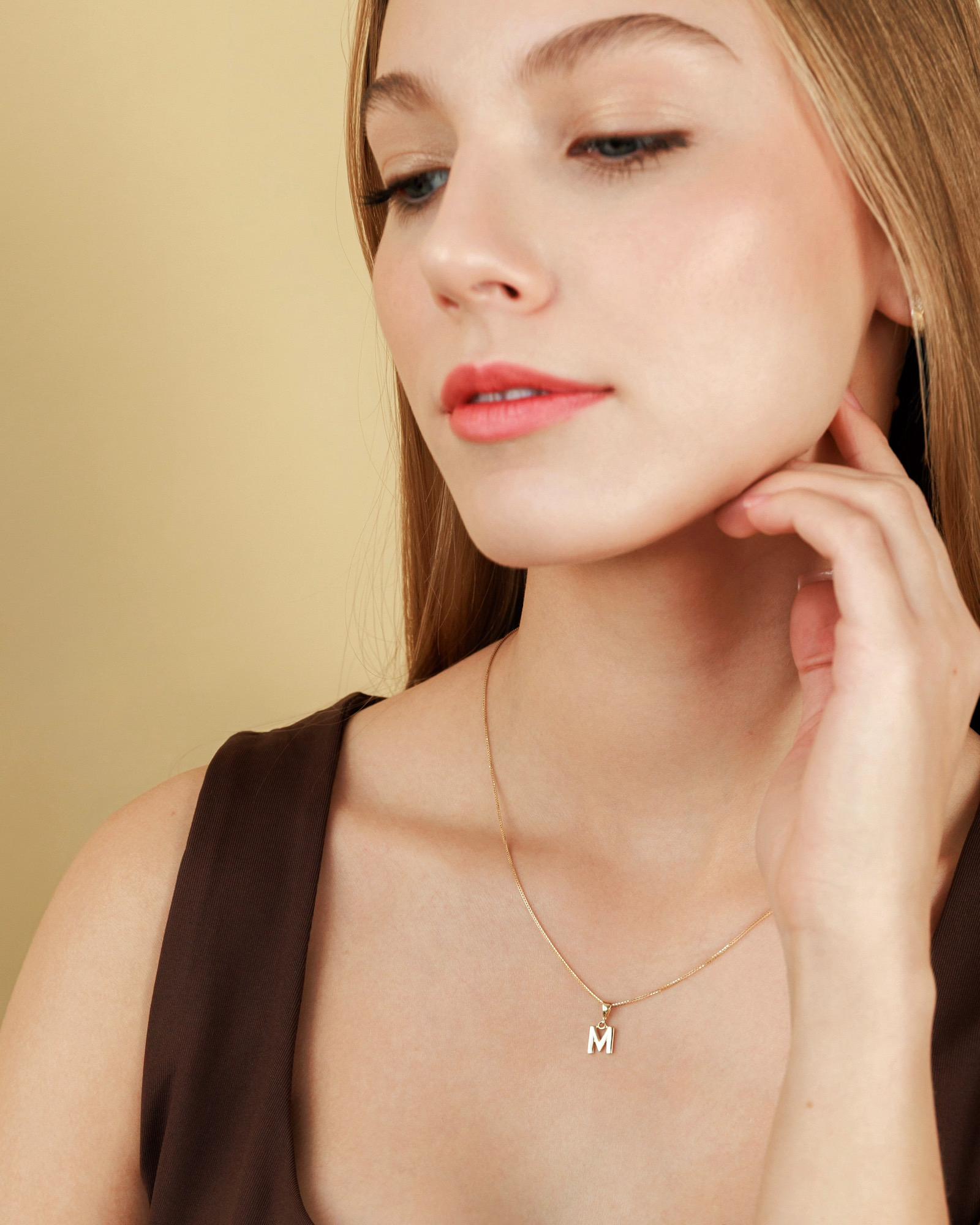 Yellow gold pendant - initial (letter) M