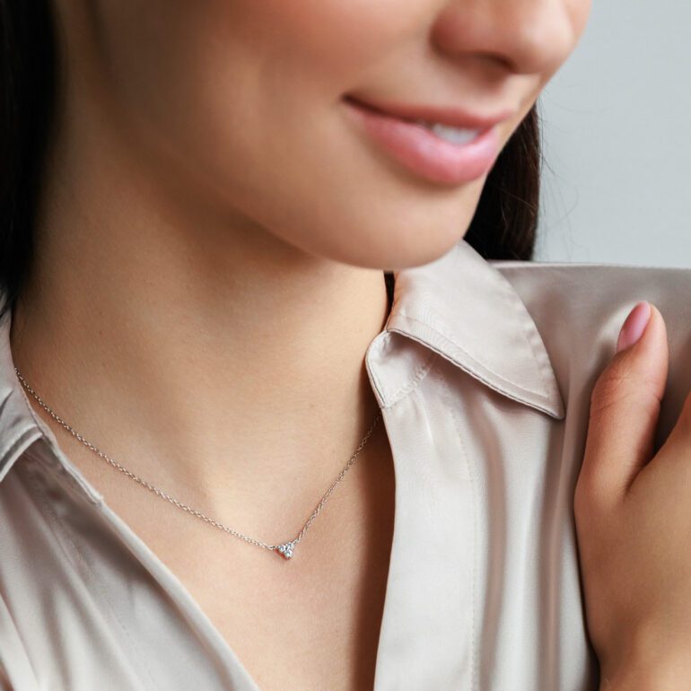 A minimalist sterling silver necklace with cubic zirconia