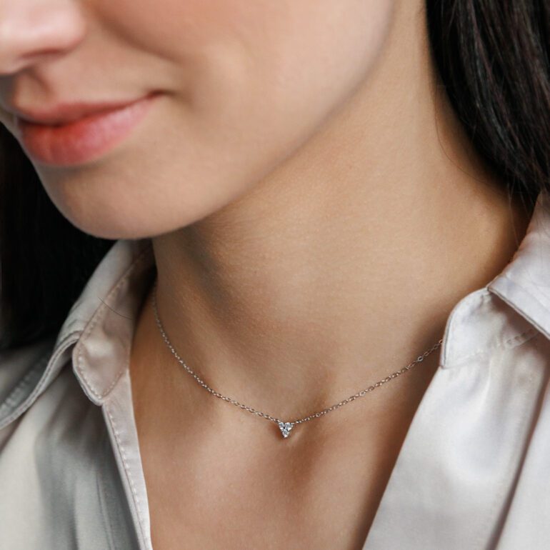 A minimalist sterling silver necklace with cubic zirconia