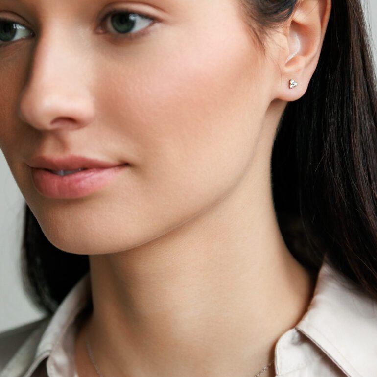 A minimalist sterling silver stud earrings with cubic zirconia