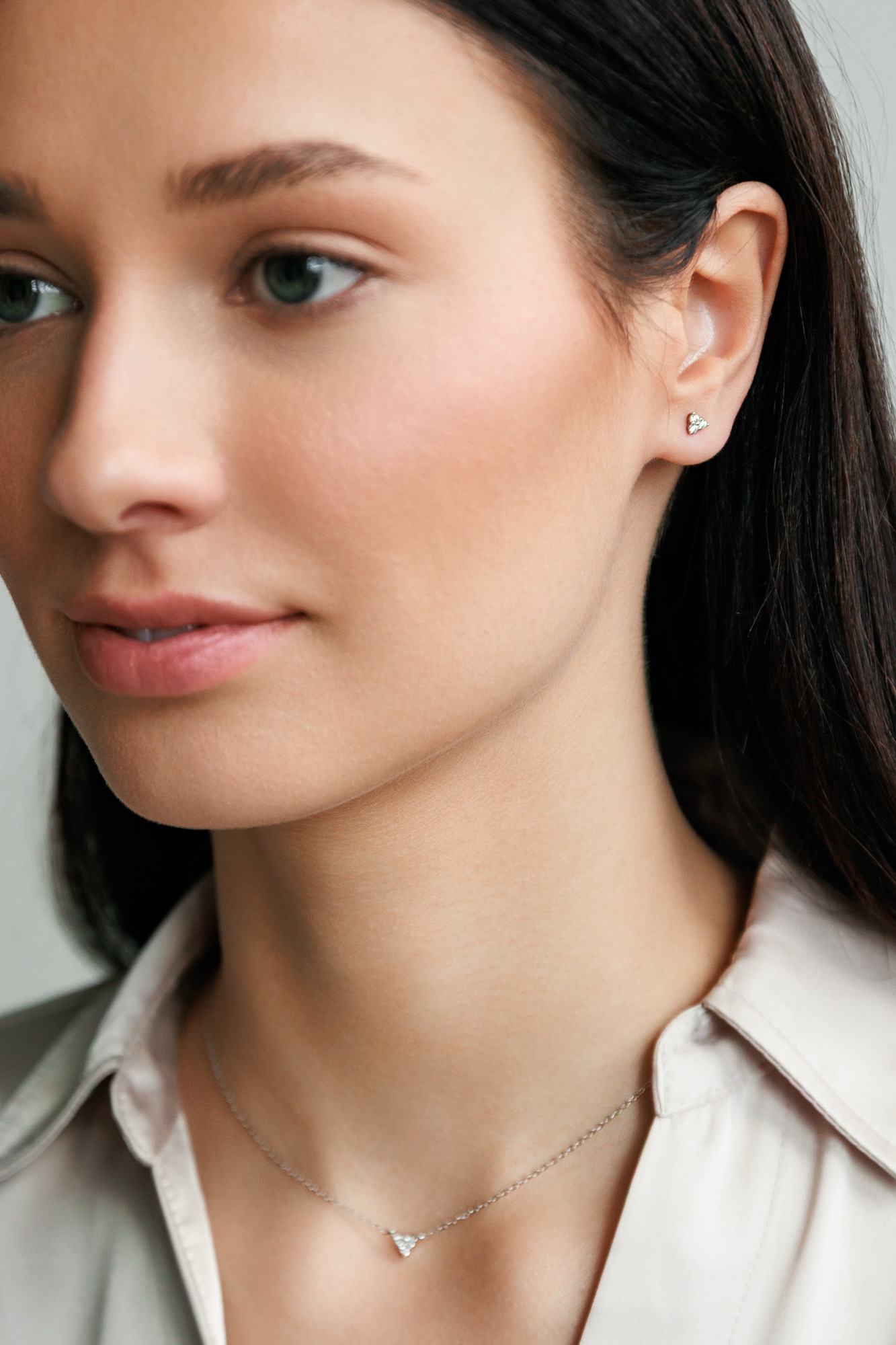 A minimalist sterling silver stud earrings with cubic zirconia