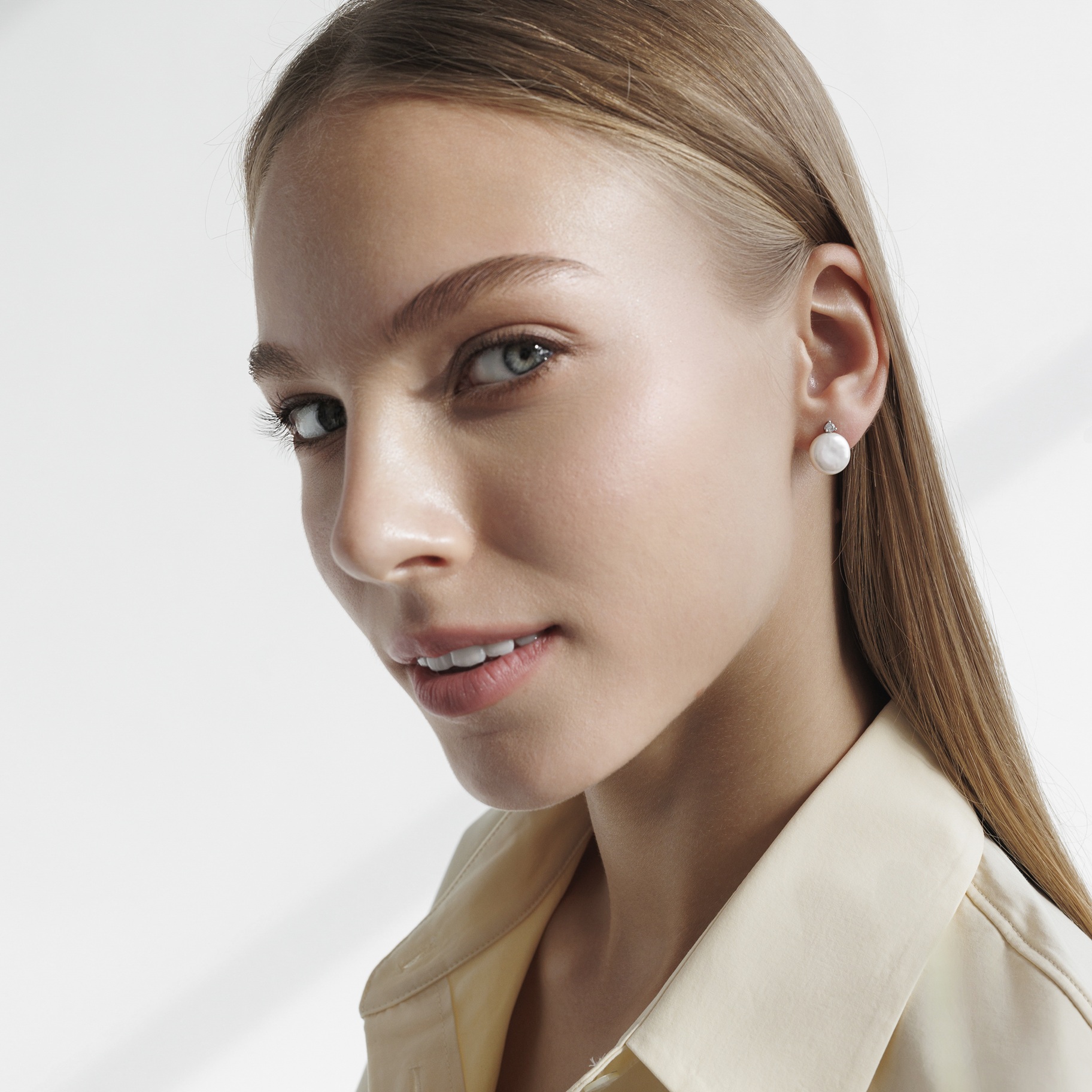 Sterling silver earrings with pearls and cubic zirconia